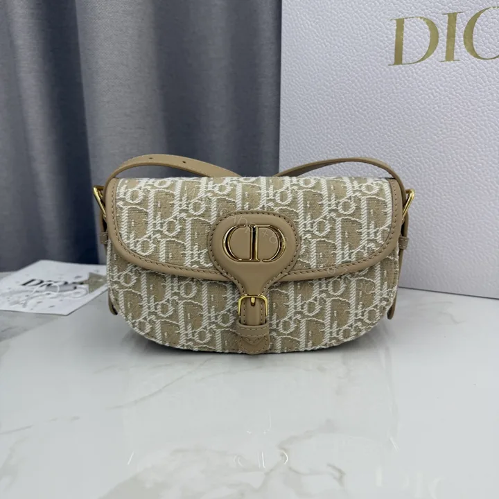 View 1 of Dior原單女款帆布老花半月包品牌圖騰刺繡設計