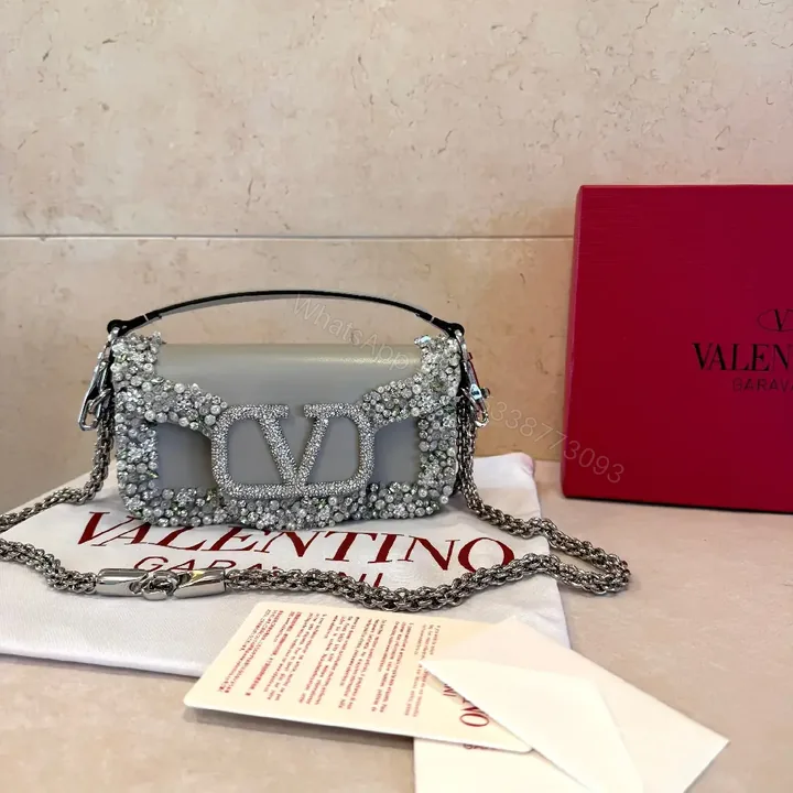 View 1 of Sparkling Crystal-Chain Mini Bag: Luxe Edge Clutch