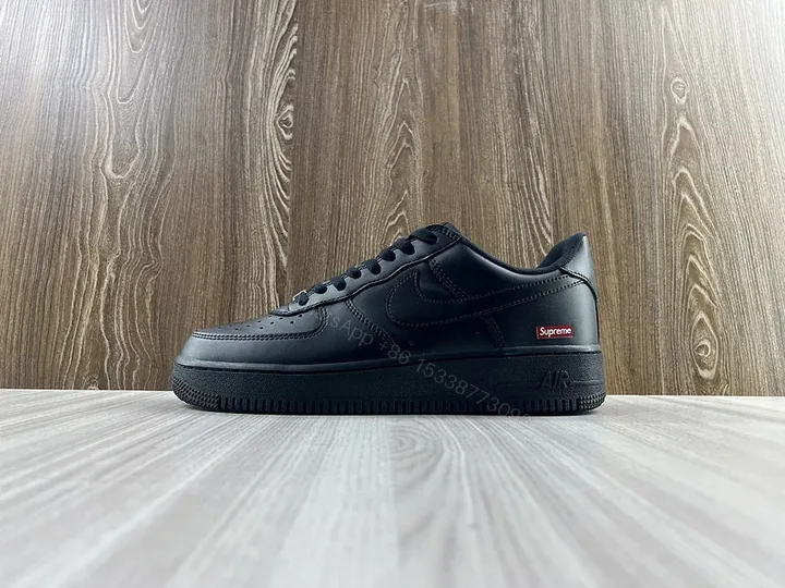 View 1 of Covert Black Leather Nike X Supreme Luxe Sneaker