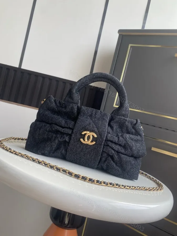 View 1 of Chic Black Denim Mini Bag with Gold Emblem
