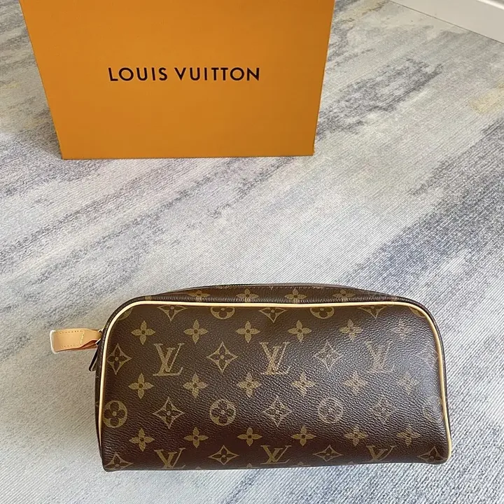 View 1 of Brown Leather-Toned LV Monogram Cosmetic Pouch with Gold Zipper