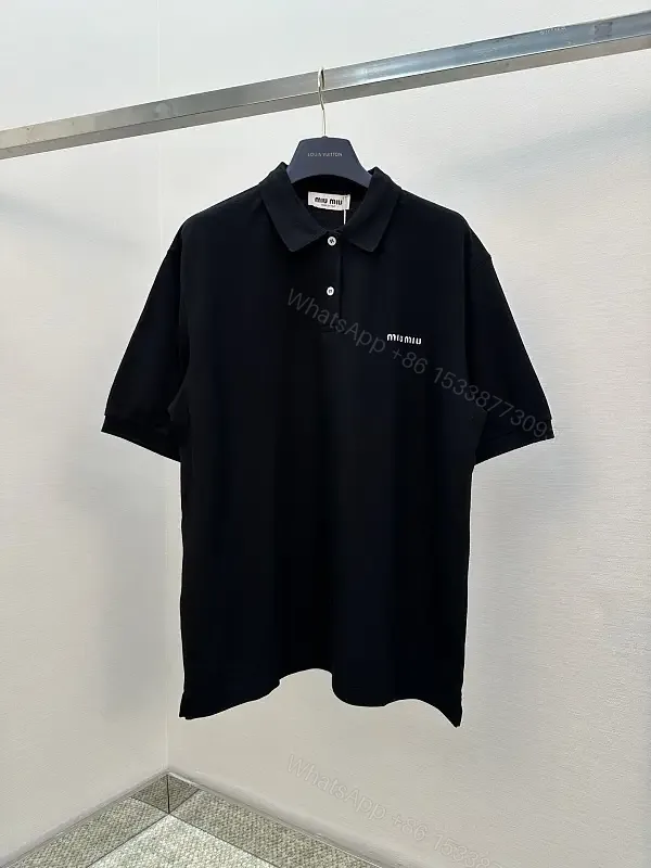 View 1 of black cotton polo shirt with logo for everyday luxury men
