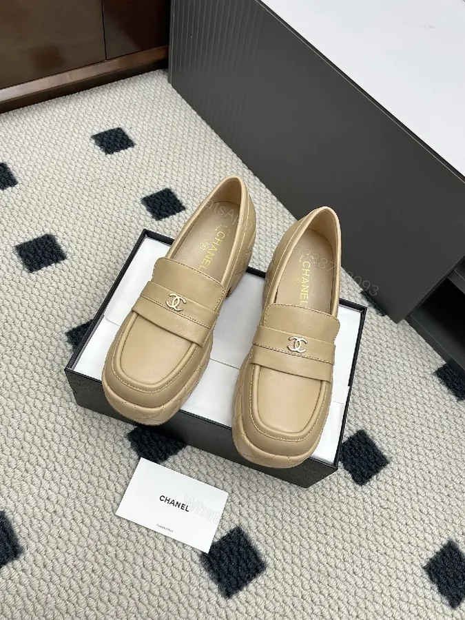 View 1 of Soft-Tone Leather Mules with Gold Logo Leather Mules, Subtle Luxury Footwear