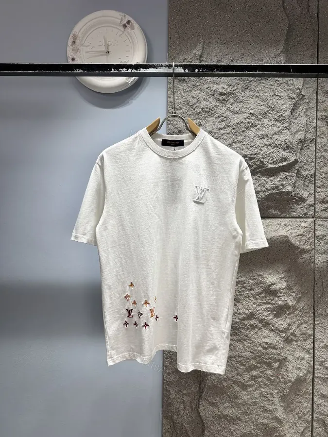 View 1 of Premium White Cotton Tee with Subtle Embroidered Accents