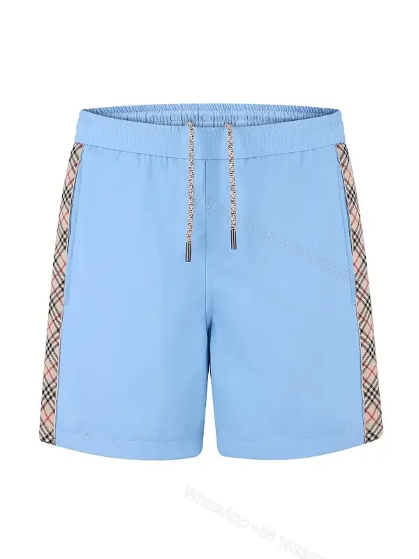 View 1 of Light Blue Cotton-Blend Swim Shorts with Burberry-Check Side Strips