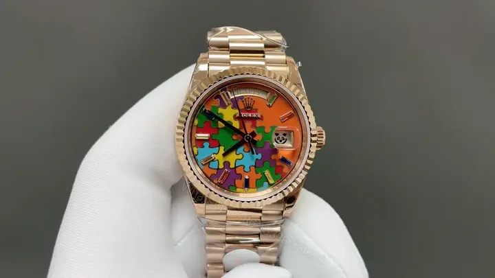 View 1 of Rolex Day-Date Emoji Puzzle Rose Gold Orange Dial Edition 36mm RG-DD36-EMOJI-PUZZLE-RG
