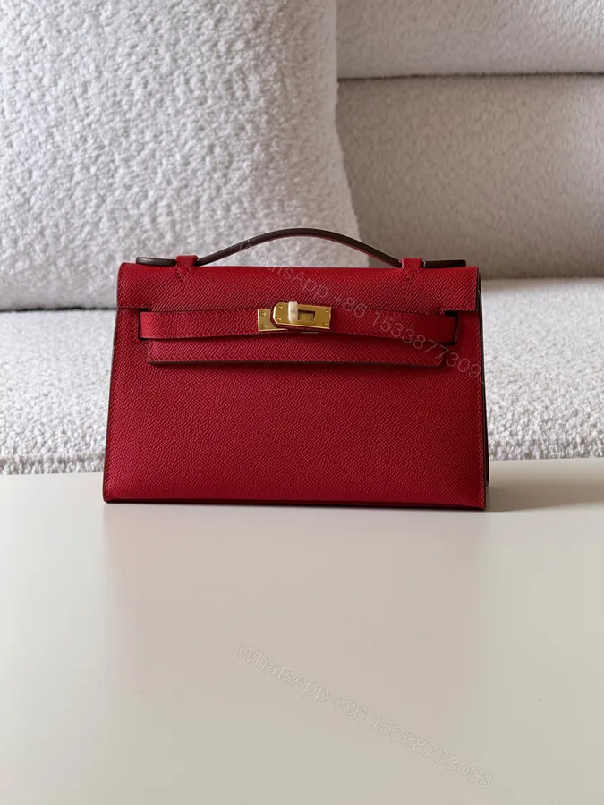 View 1 of Hermès Kelly Red Color Pochette Bag