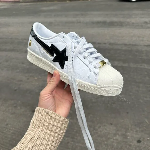 View 1 of Adidas Superstar BAPE White Black First Copy Shoes — Women's | COD India