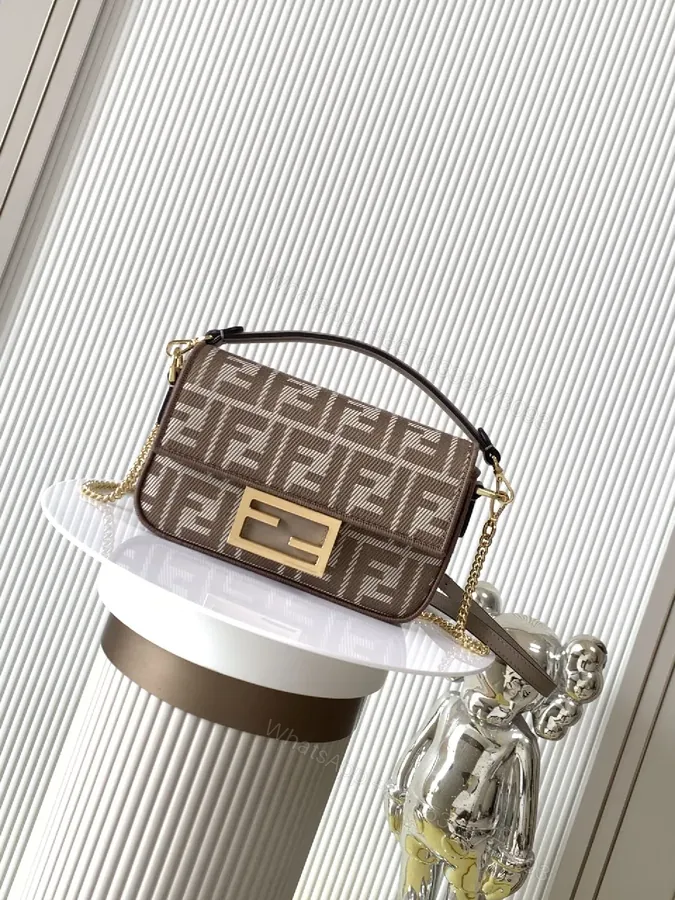 View 1 of Gold-Accented Monogram Crossbody Bag