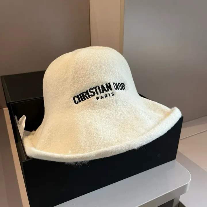 View 1 of Soft Wool Bucket Hat â€” Dior Paris Logo, Minimal Luxury