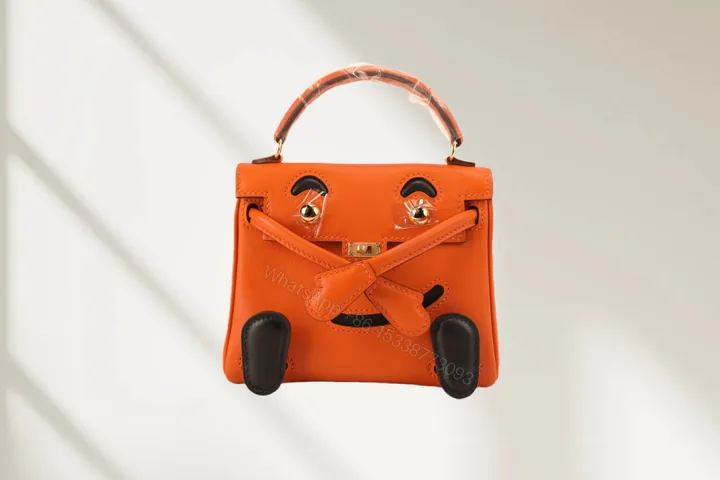View 1 of Hermes 原單 Kelly Doll 笑臉包 迷你手提包 橘色款