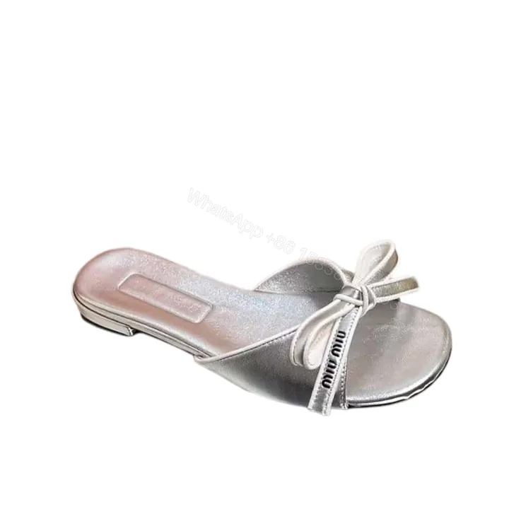 View 1 of MIUMIU MORDORÉ NAPPA SANDALS WITH BOW SILVER
