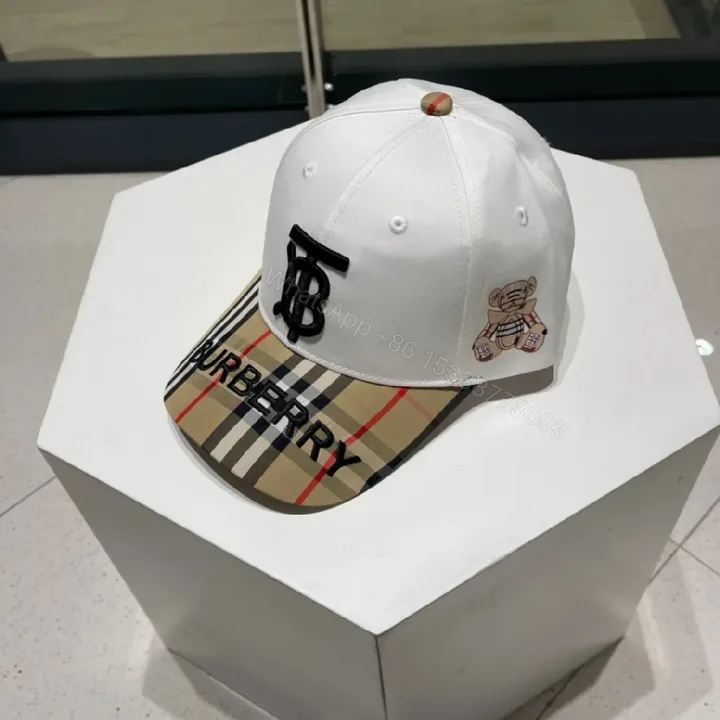 View 1 of White Cotton Cap with Plaid Brim and Logo Embroidery