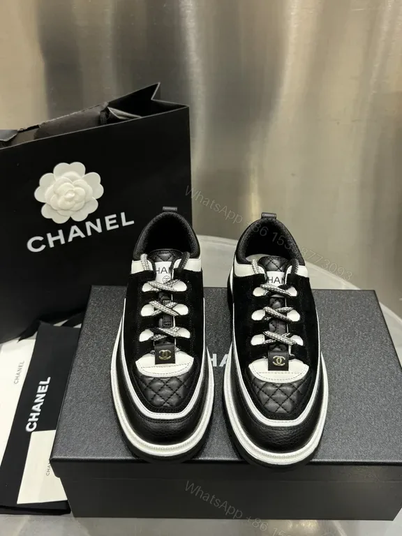 View 1 of Chic Black-White Quilted Leather High-Tops Sneakers
