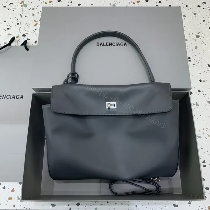 View 1 of Neutral Leather Structured Handbag with Subtle Hardware