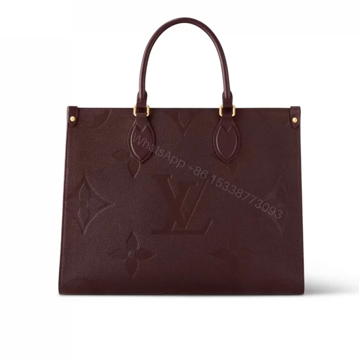View 1 of Louis Vuitton Onthego MM Monogram Empreinte Wine Red 35Cm M46601