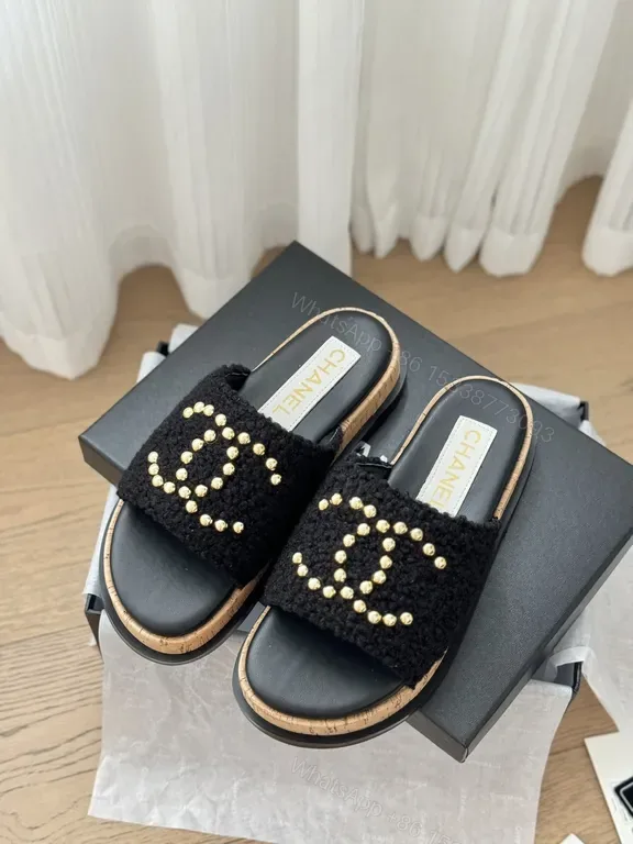 View 1 of Chanel-Inspired Black Knit Slides with Gold Logo Accents