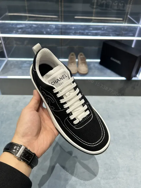 View 1 of Black & White Chanel-Style Low-Top Sneakers: Everyday Luxury