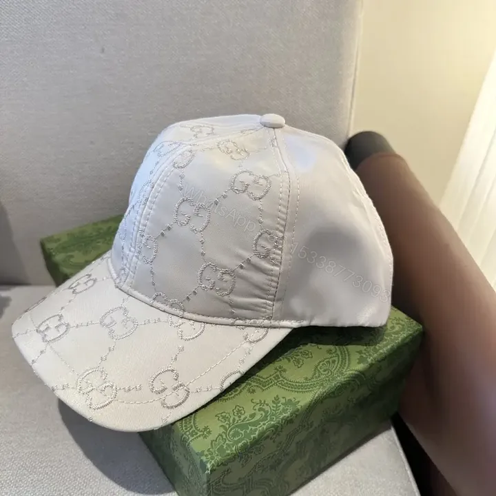 View 1 of White/Cotton Casual Baseball Cap with Interlocking Stitch Pattern
