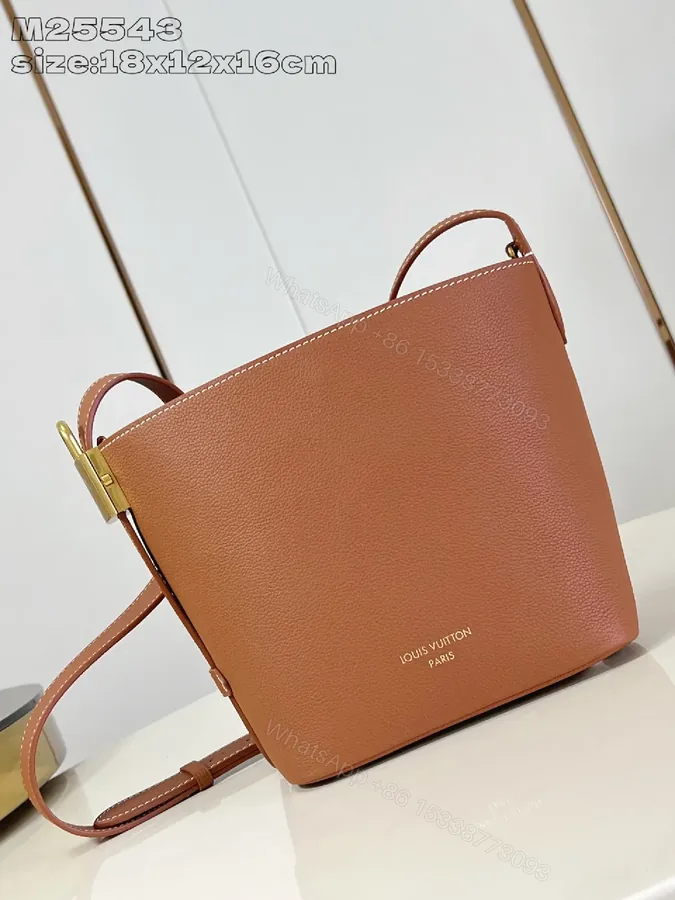 View 1 of Caramel Leather Bucket Bag - Structured, Minimal Hardware, Everyday Luxury