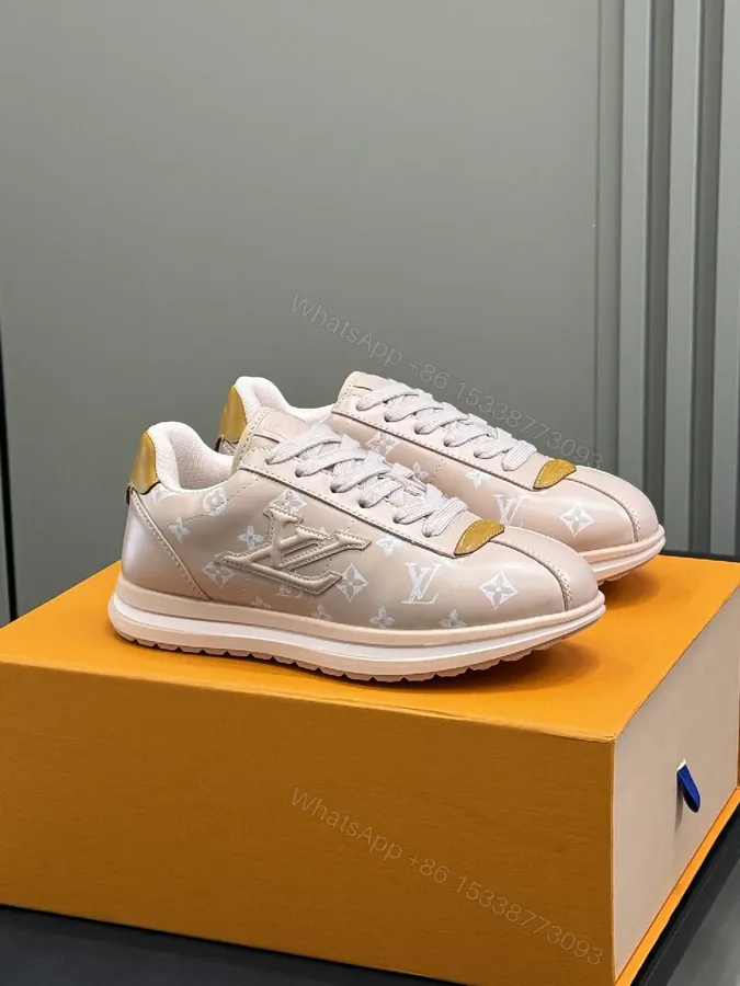 View 1 of Soft Pink Monogram-Style Sneakers: Subtle Luxury, Everyday Comfort