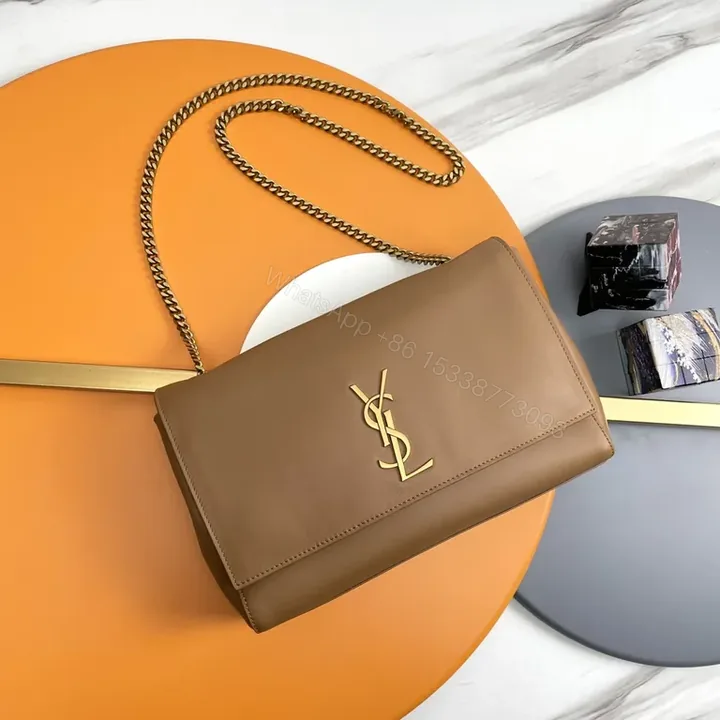 View 1 of Gold-Tone Logo Crossbody Bag: Minimal Leather Luxury