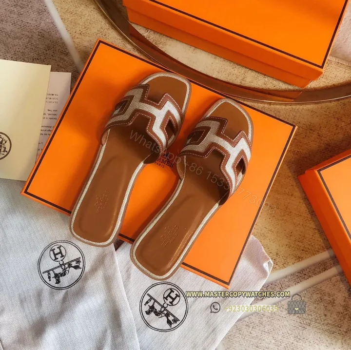 View 1 of Hermes Ladies Sandals Flat Oran Brown with white
