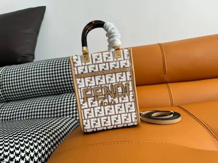 View 1 of Fendi Forma Mini Bag: Monogram Texture, Gold Accents, Crossbody Carry
