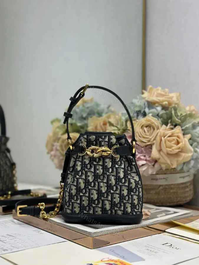 View 1 of Black Leather Monogram Mini Bag: Gold Hardware, Structured, Compact