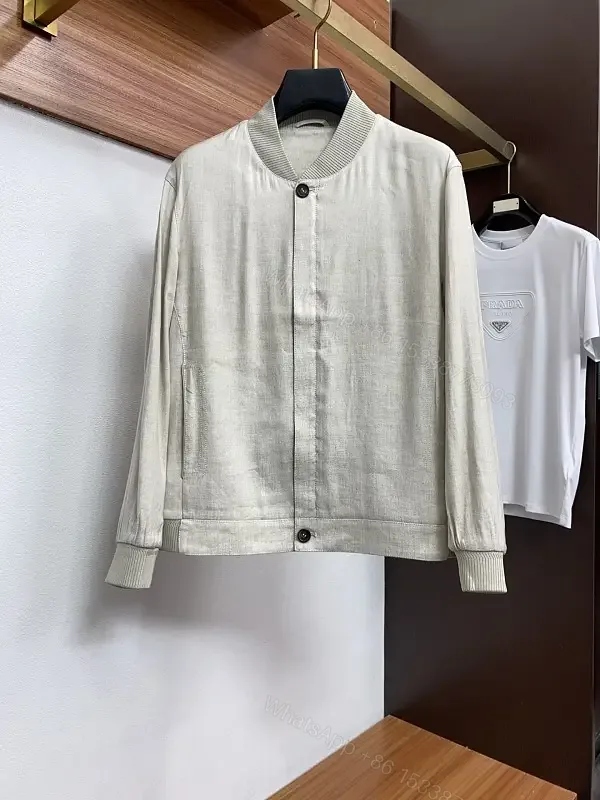 View 1 of Light Beige/Ash Bomber Jacket: Smooth Matte, Minimal Details