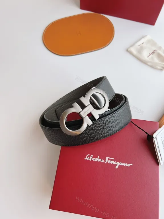 View 1 of Ferragamo Gancini Belt: Black Leather, Silver Buckle, Modern Classic