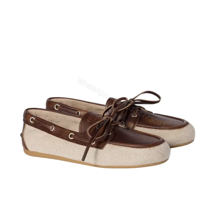 View 1 of MIUMIU CANVAS AND BLEACHED LEATHER BOAT SHOES BEIGE