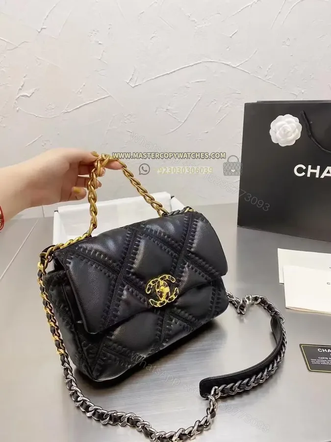 View 1 of Chanel Black with Gold touch Mini flap Bag