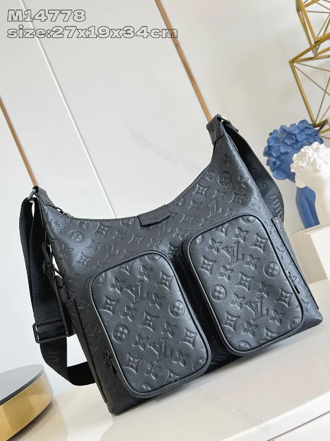 View 1 of Textured Leather Everyday Carry Bag: Minimalist Leather, Crossbody Style, Monogram Texture, 2 Front Pockets, Durable Sizing