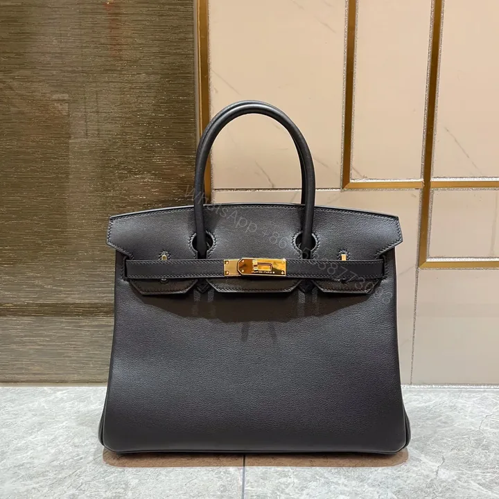 View 1 of HN 30CM BLACK SWIFT LEATHER GOLD HARDWARE