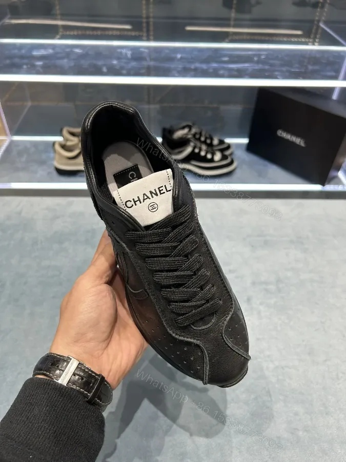 View 1 of Black Leather-Trim Sneaker with Perforations + Luxe Casual Sneakers