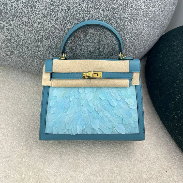 View 1 of HERMES KELLY CUSTOM FEATHER TADELAKT