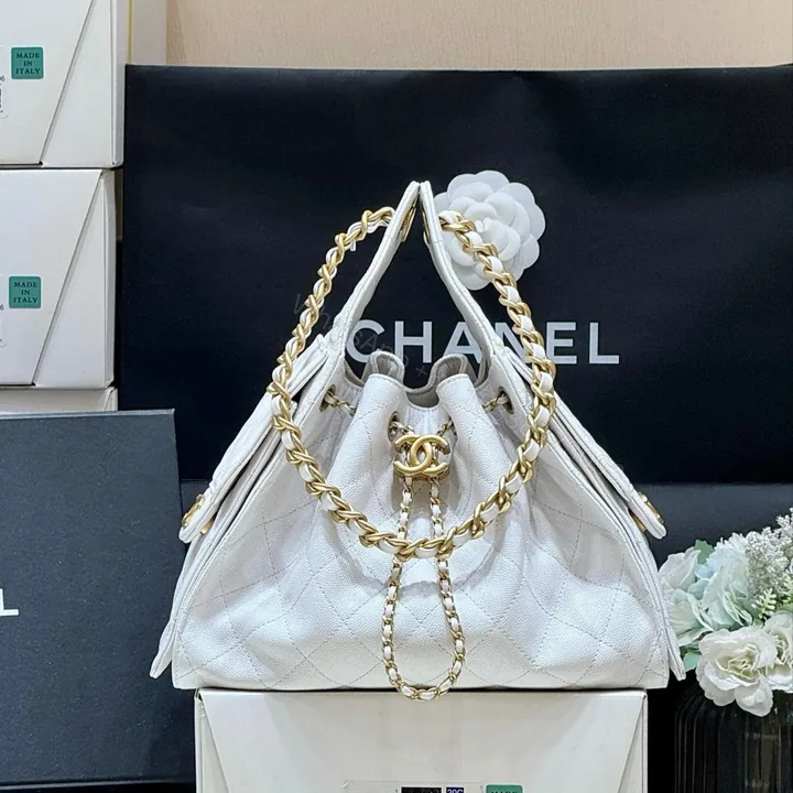 View 1 of CHANEL 25 HANDBAG IN WHITE 30 GOLD HARDWARE