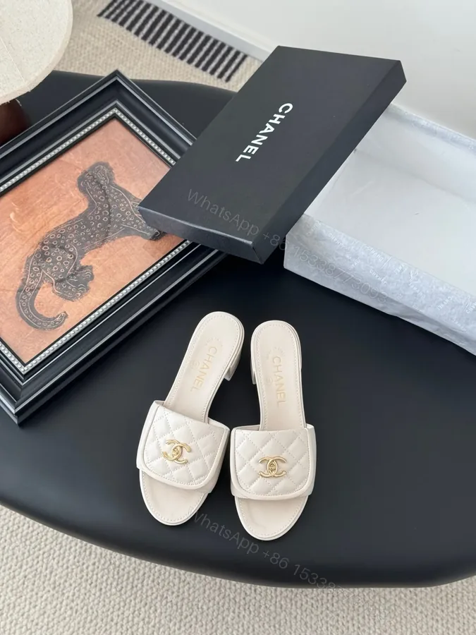 View 1 of Chanel Women Ivory Quilted Leather Mules