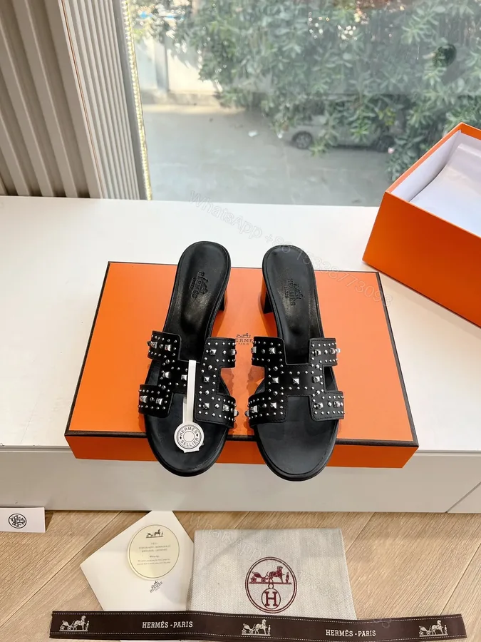 View 1 of Hermes Women Black Leather Studded Mules
