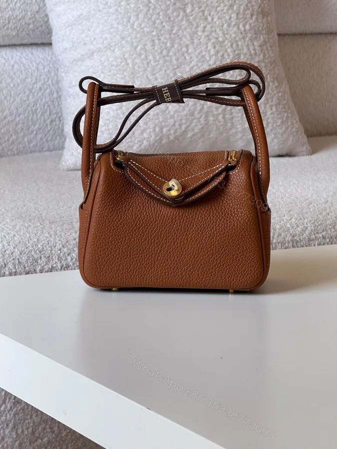 View 1 of Hermès Mini Lindy 20 bag in Gold Clemence leather