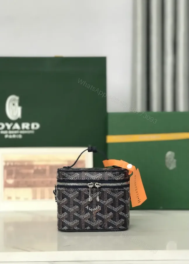 View 1 of Colorful coated-canvas pouch with distinctive pattern, compact design, durable, luxury vibe