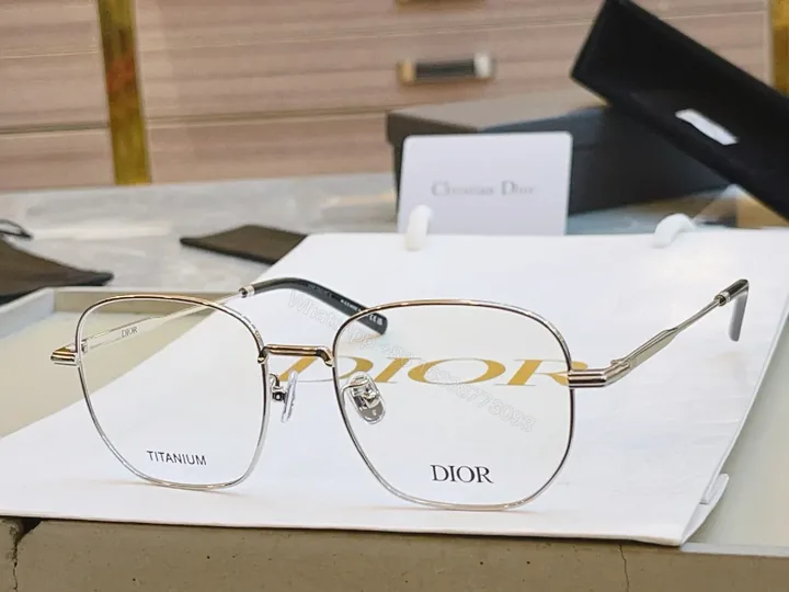 View 1 of Elegant Titanium Rim Eyewear: Subtle Designer Accents Suiting Any Look