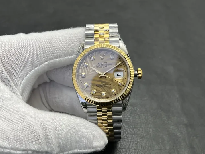 View 1 of Rolex Datejust 36 Stainless Steel Yellow Gold Fluted Champagne Palm Diamond Jubilee 126233-0043