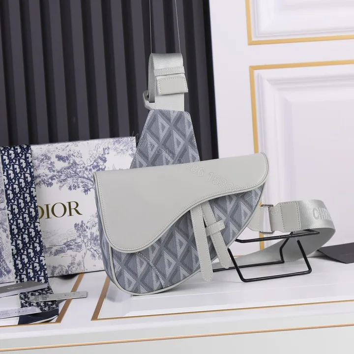 View 1 of Dior Saddle Bag with Embossed Dior signature on interior
