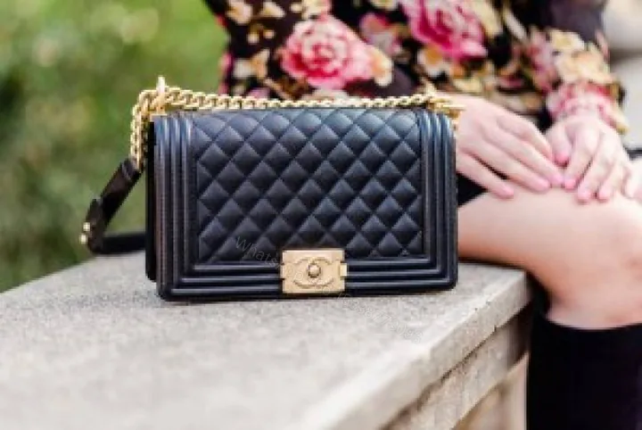 View 1 of First Copy Chanel Classic Black Quilted Flap Bag With Gold Turn Lock And Chain Strap