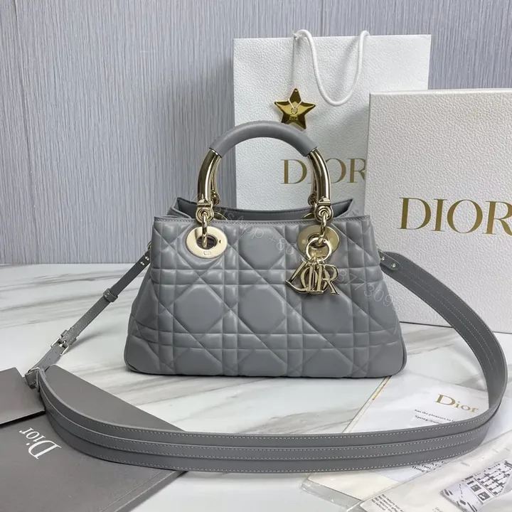 View 1 of Chic Grey Quilted Satchel: Gold-Dior Inspired Luxury Bag