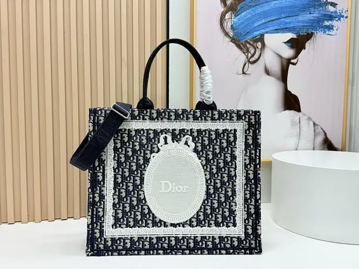 View 1 of Textured tote bag: structured luxury, bold lettering, durable