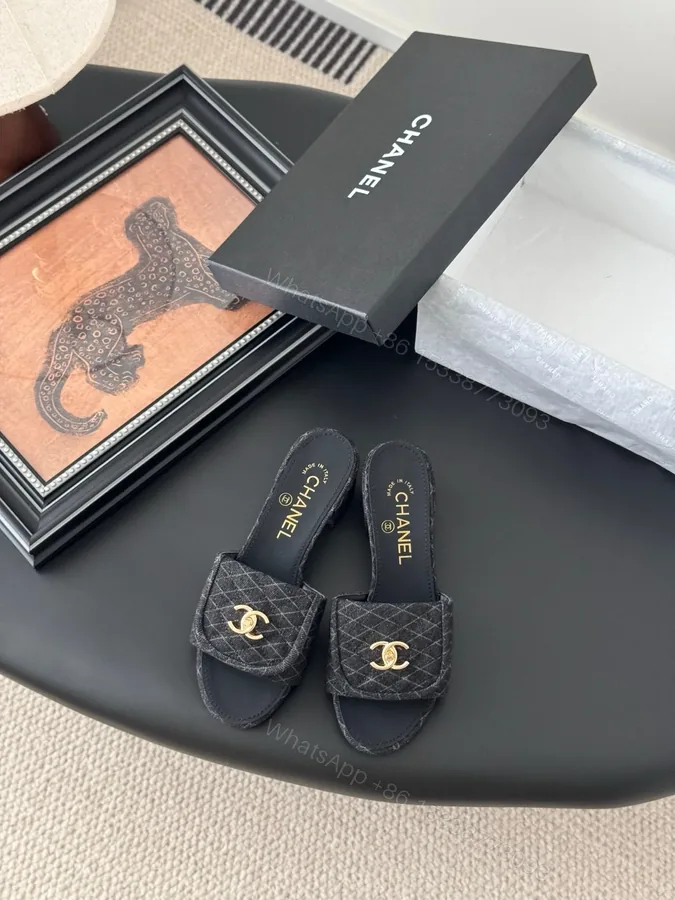 View 1 of Chanel Women Black Quilted Fabric Slides