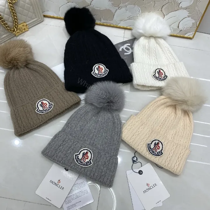 View 1 of Neutral Knit Beanie with Plush Pom and Luxe Patch
